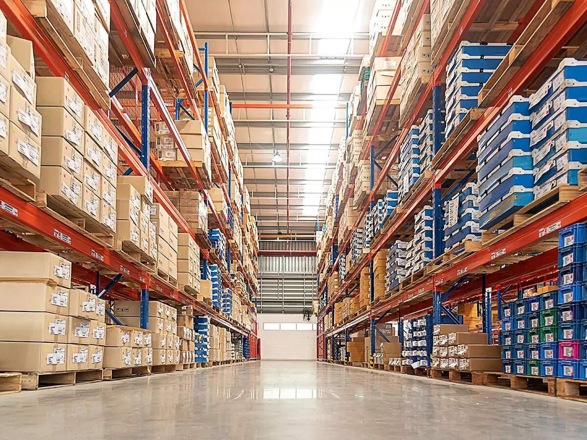 Warehouse aisles with stock on shelves